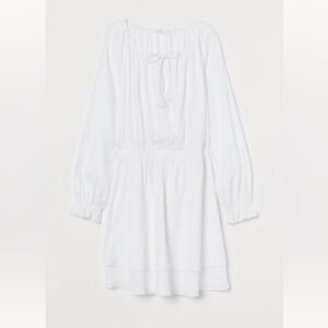 White smocked cotton long sleeve dress